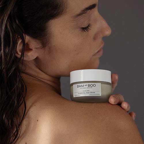 Women Holding Cream Jar - Elemental Face Cream Day and Night - Best Sellers Collection - BAMandBOO Grounded Skincare Azores